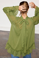 Thumbnail for caption_Model wears Olive Elinor Blouse in UK size 10/ US 6