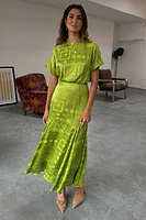 Thumbnail for caption_Model wears Lime Safari Erin Dress  in UK size 8/ US 4