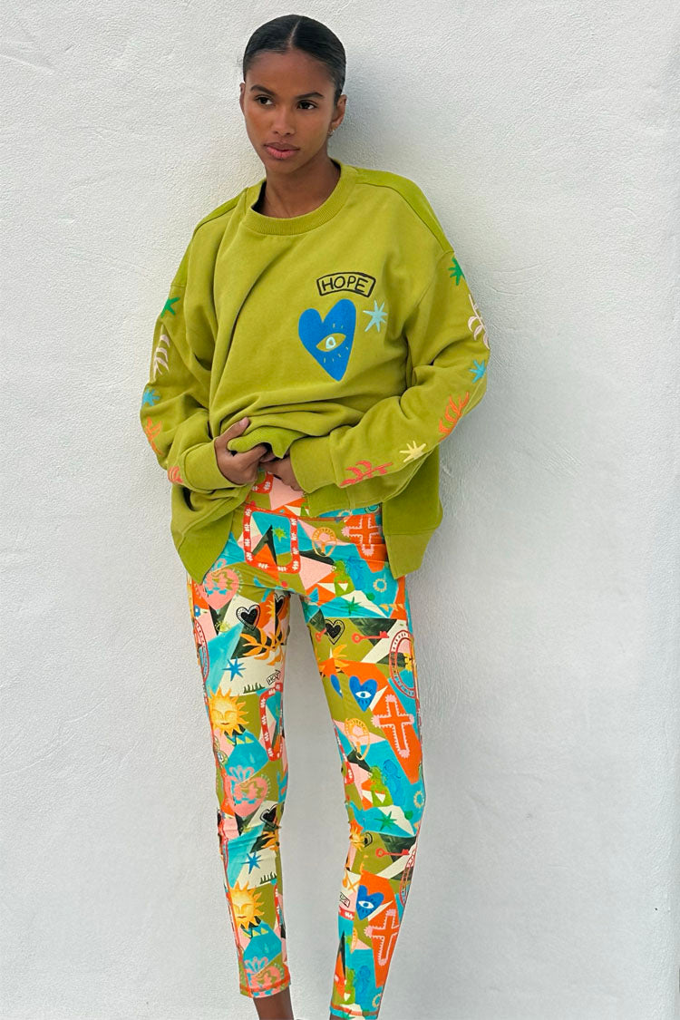 caption_Model wears Hope Green Sweater in UK size 10/ US 6