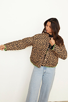 Thumbnail for  caption_Model wears Green Wild Jungle Quilted Coat in UK size M