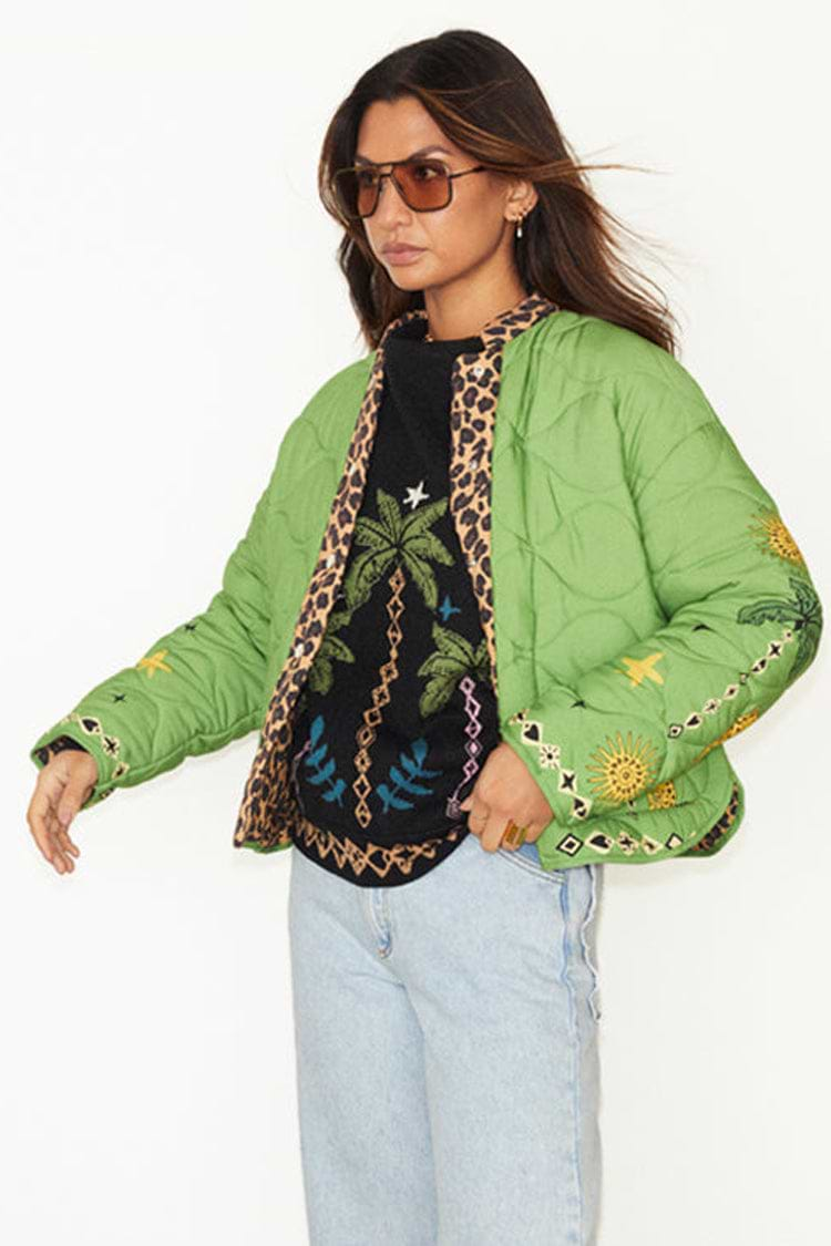 caption_Model wears Green Wild Jungle Quilted Coat in UK size 10/ US 6