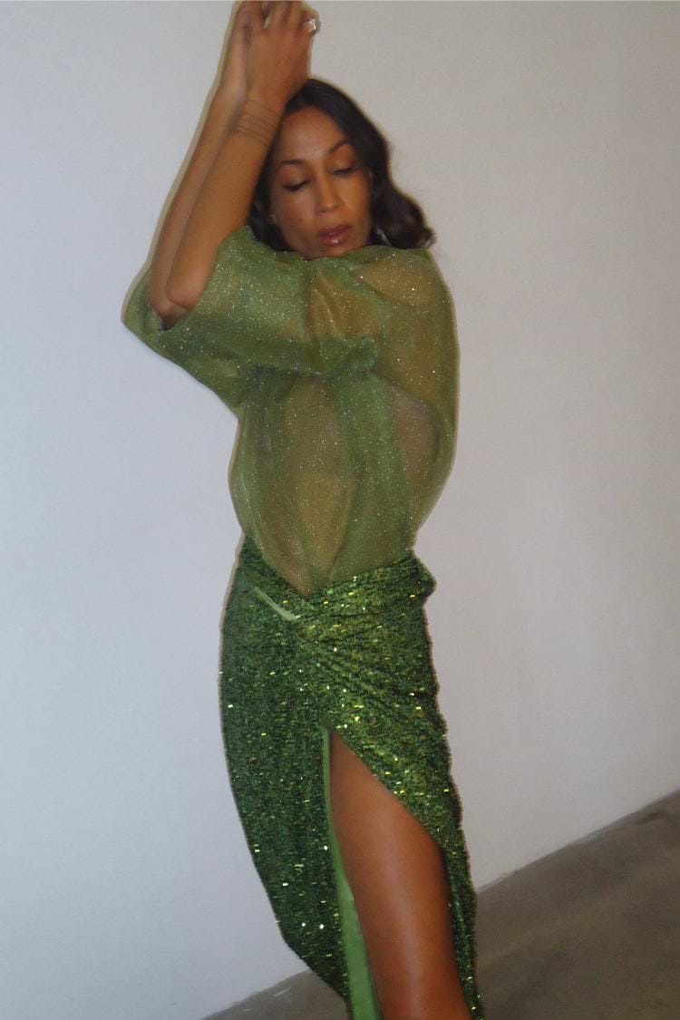 caption_Model wears Green Zazi jumper in size M