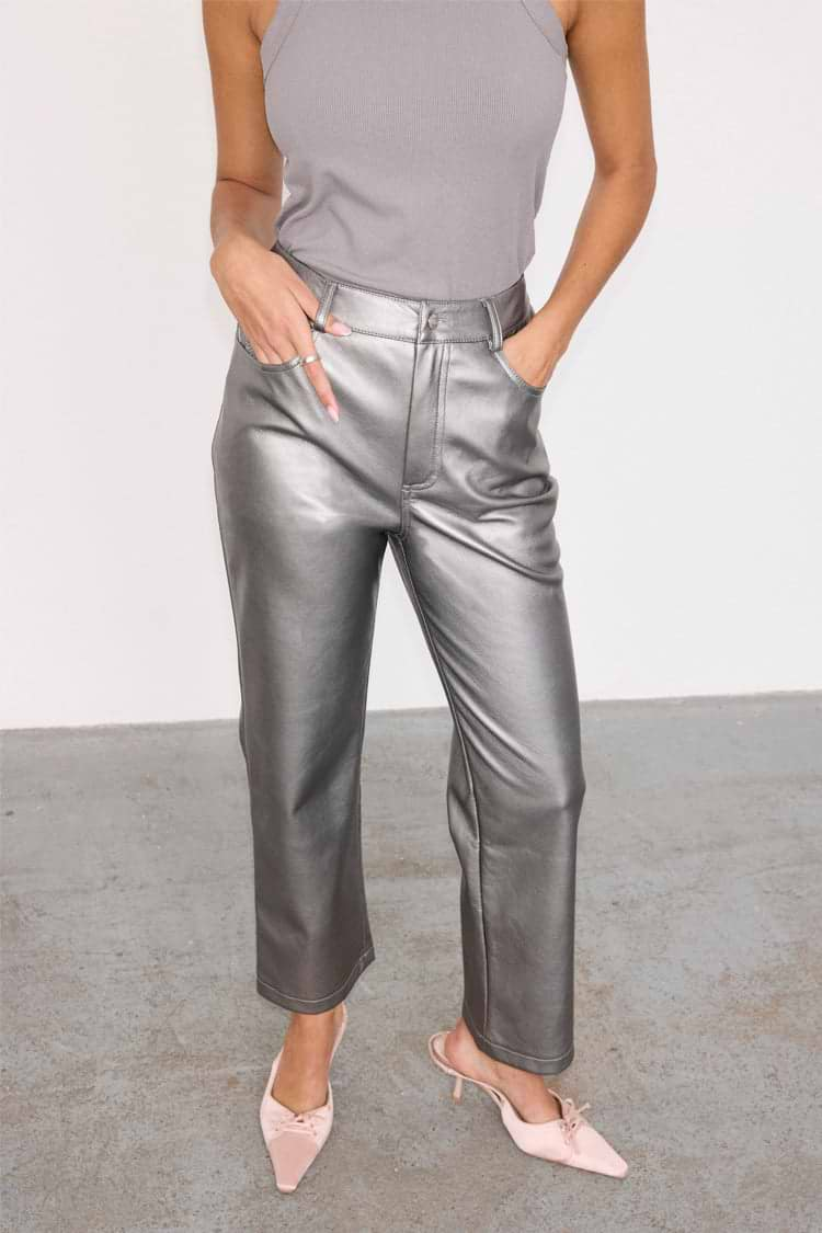 caption_Model wears Gunmetal Vegan Leather Trousers in UK size 10/ US 6