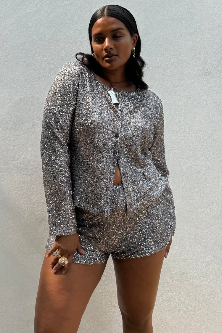 caption_Model wears Gunmetal  Alexa Sequin Cardigan in UK size 16 / US 12