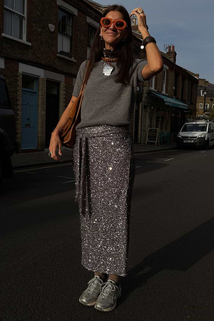 caption_Model wears Gun Metal Sequin Jaspre Midi Skirt in UK size 10/ US 6