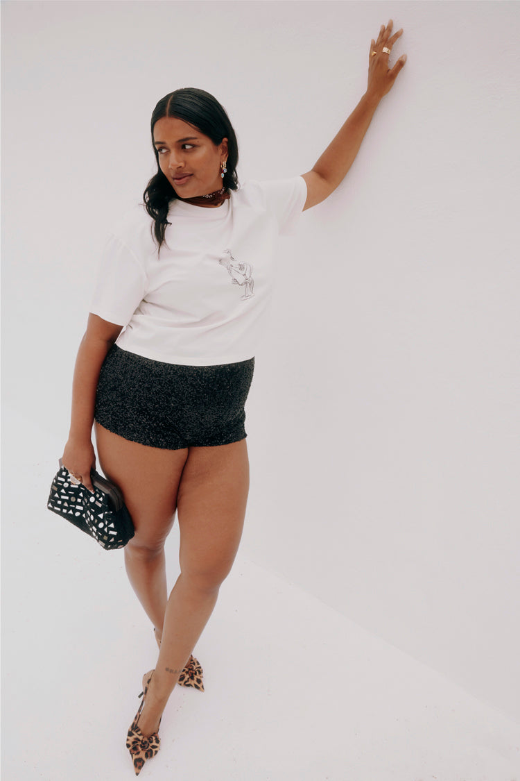 caption_Model wears Black Sequin Hot Pants in size XL