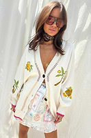 Thumbnail for caption_Model wears Cream Ibiza Martha Cardigan in UK size 10/ US 6