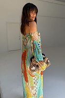 Thumbnail for caption_Model is 5ft7” and is sizing up in the size M/L