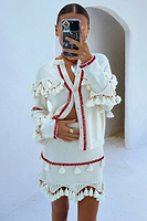 Thumbnail for caption_Model wears Ivory and Red Harper Cardigan in size S