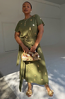 Thumbnail for caption_Model is 5ft6” and wears size L