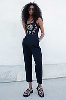 Thumbnail for Model wearing Black Leopard Embroidered Jumpsuit 