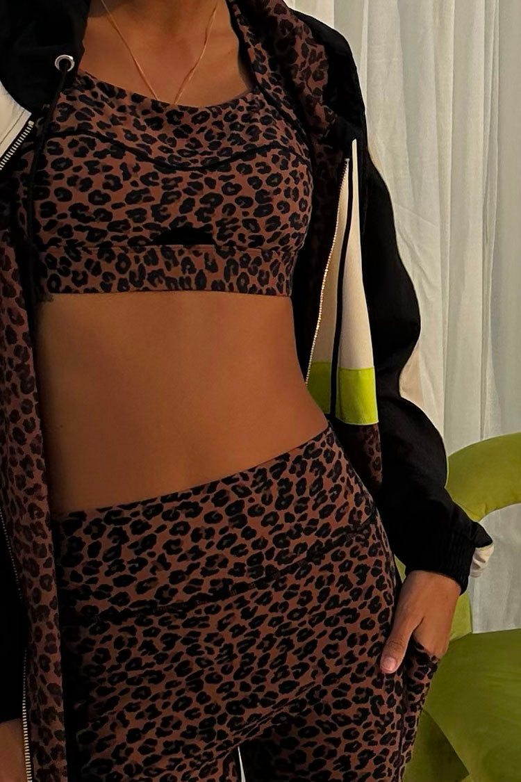 caption_Model wears Leopard Sports Bra in UK size 8/ US 4