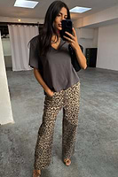 Thumbnail for caption_Model wears  Leopard Lucia Scallop Detail Jeans in UK size 8/ US 4