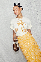 Thumbnail for caption_Model wears Cream and Gold Mosaic Leopard T-Shirt in UK size 10/ US 6