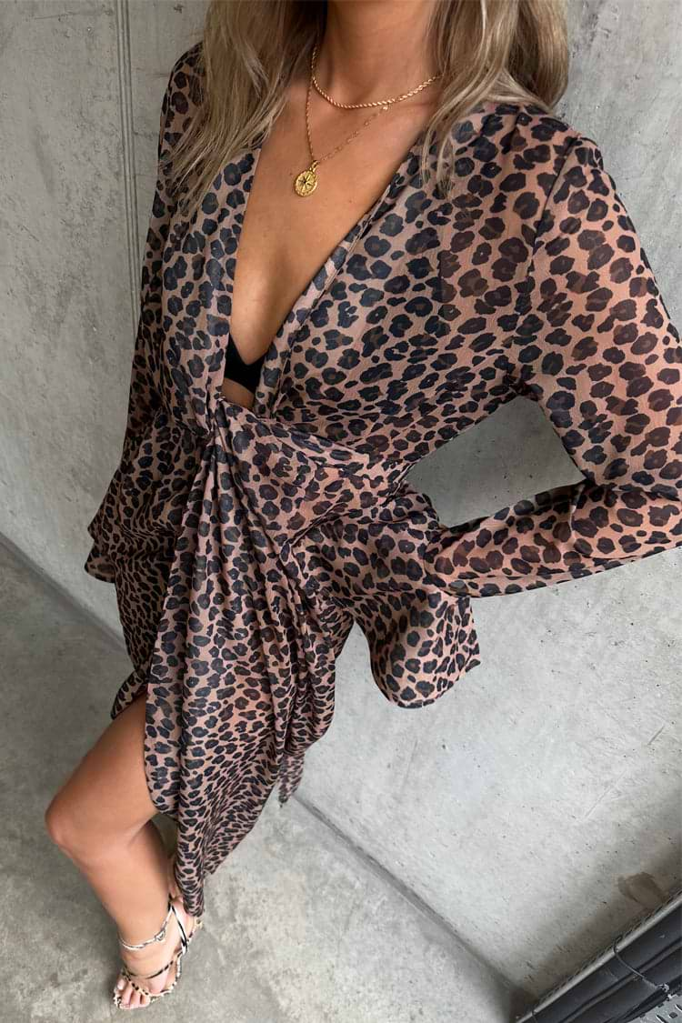 caption_Model wears  Leopard Lucia Sheer Wrap Dress in UK size 10/ US 6