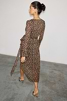 Thumbnail for caption_Model wears  Leopard Lucia Sheer Wrap Dress in UK size 10/ US 6