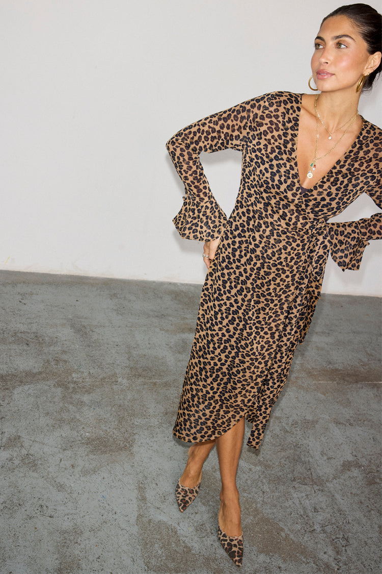 caption_Model wears  Leopard Lucia Sheer Wrap Dress in UK size 10/ US 6