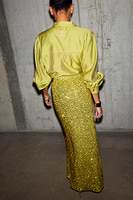 Thumbnail for caption_Model wears Lime Sequin Dorris Skirt in UK size 10/ US 6