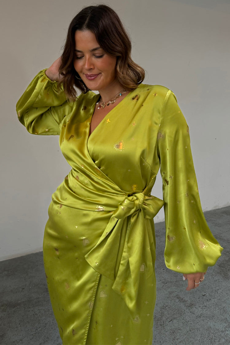 caption_Model wears Lime Hearts Vienna Wrap Dress in UK size 18/ US 14