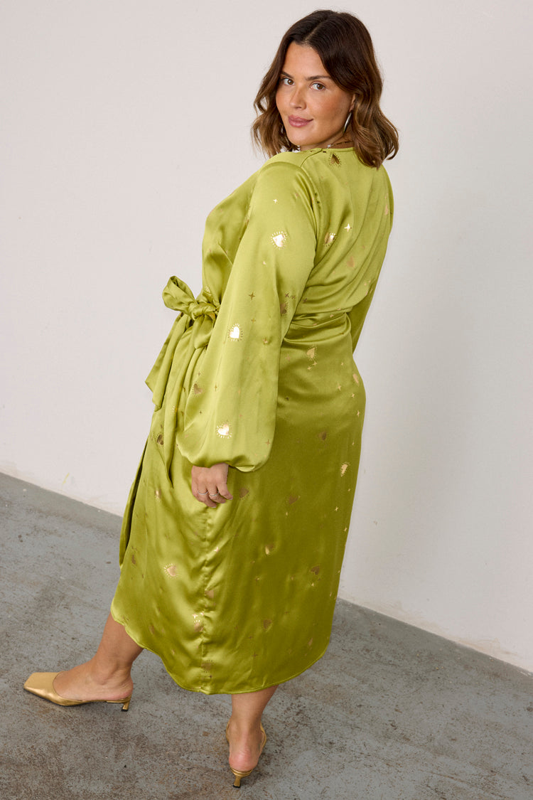 caption_Model wears Lime Hearts Vienna Wrap Dress in UK size 18/ US 14