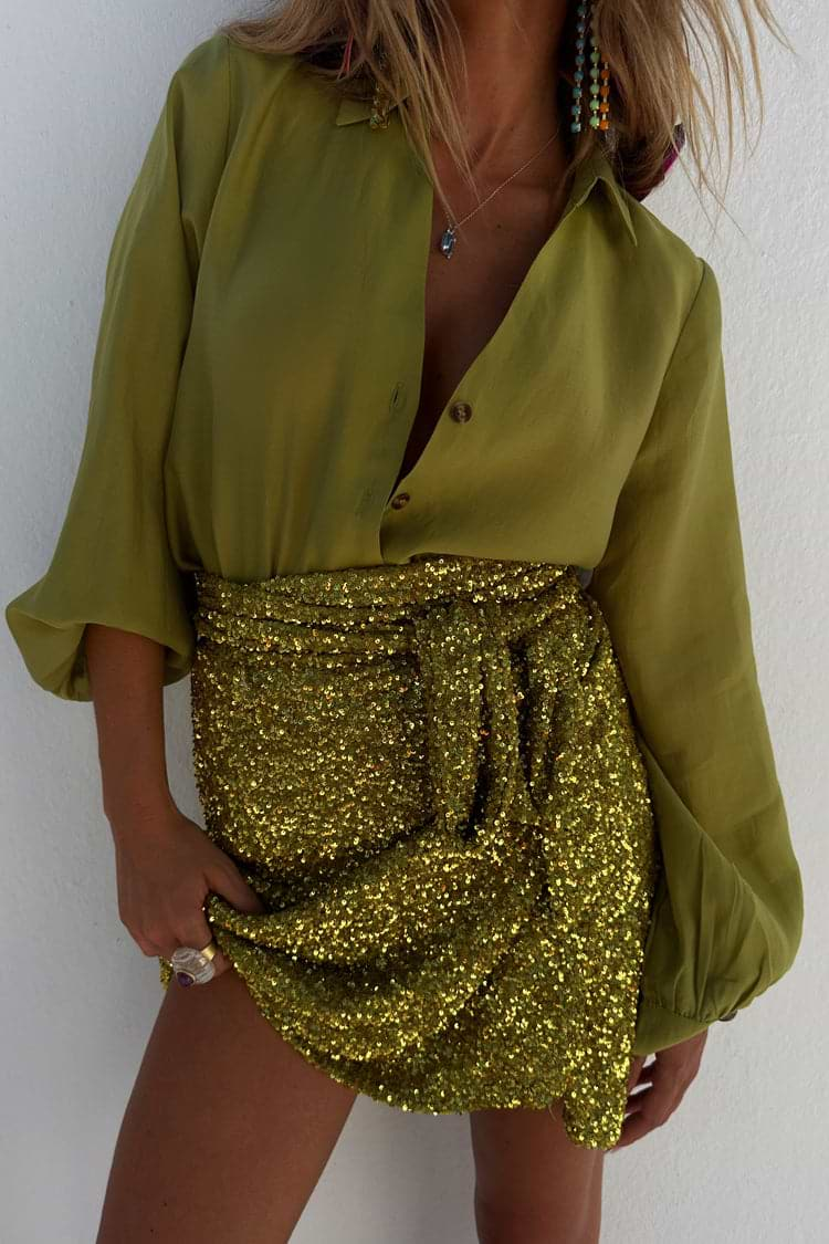 caption_Model wears Lime Sequin Mini Jaspre Skirt in UK size 10/ US 6