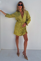 Thumbnail for caption_Model wears Lime Sequin Mini Jaspre Skirt in UK size 10/ US 6
