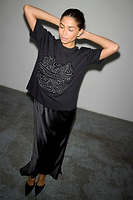 Thumbnail for caption_Model wears Black Beaded Logo T-shirt in size M