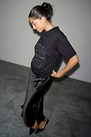 Thumbnail for caption_Model wears Black Beaded Logo T-shirt in size M