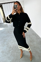 Thumbnail for caption_Model wears Black and Cream Fringe Straight Knit Skirt  in size S