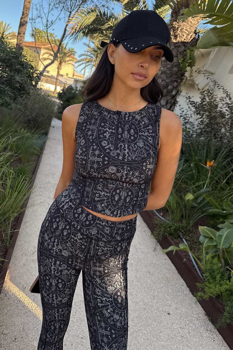caption_Model wears Map Sports Top  in UK size 8/ US 4