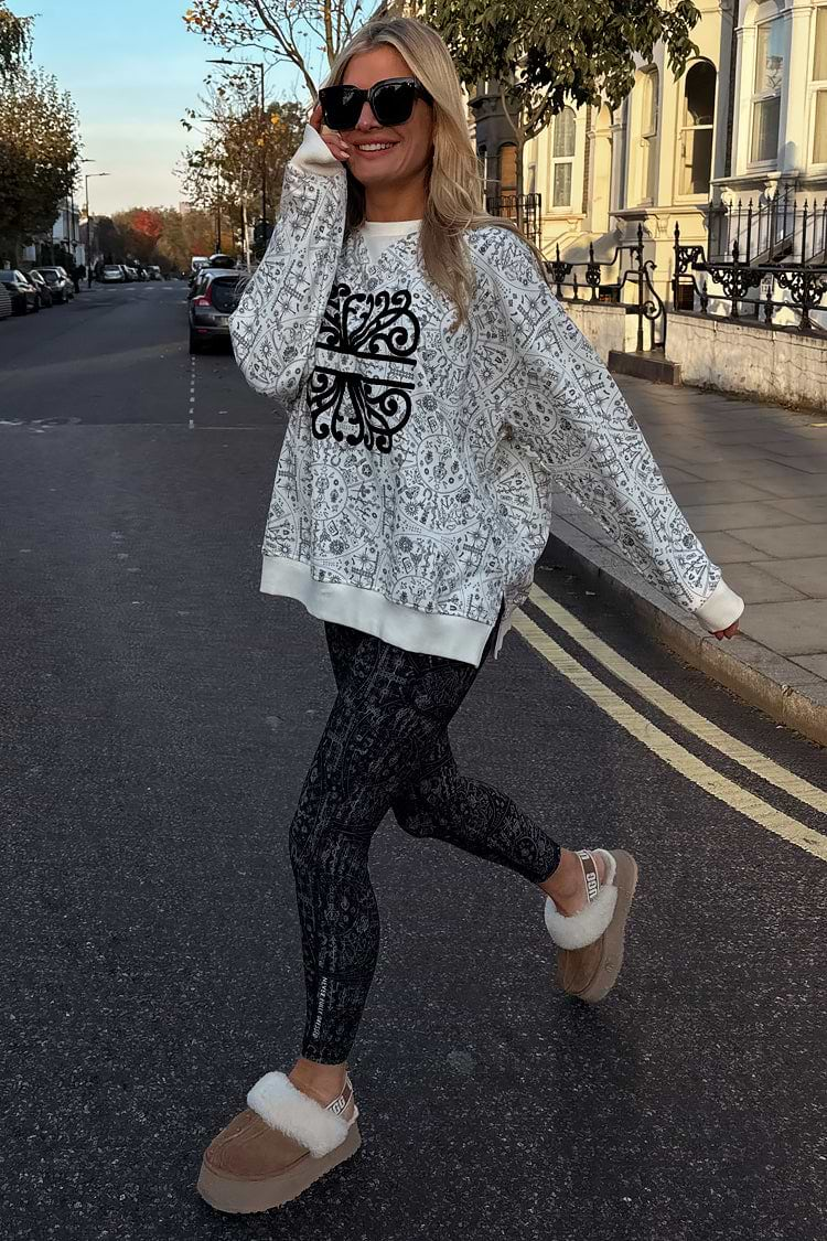 caption_Model wears Map Sweatshirt  in UK size 10/ US 6