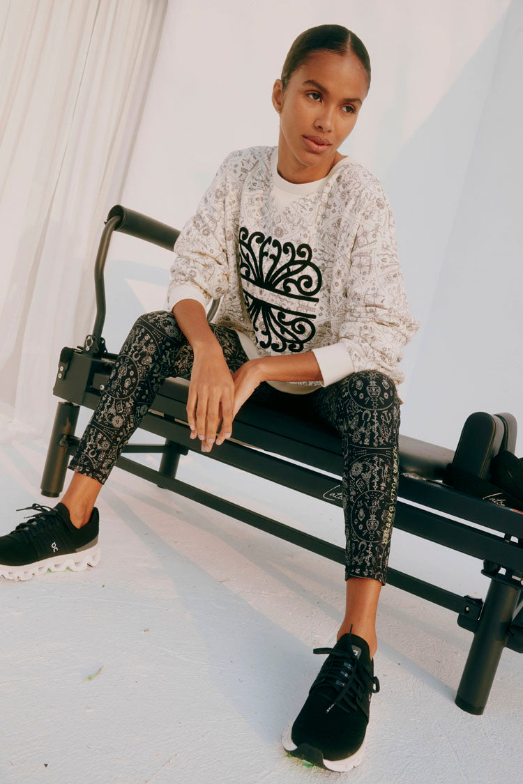 caption_Model wears Map Sweatshirt  in UK size 10/ US 6