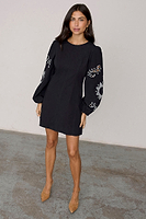 Thumbnail for caption_Model wears Black Enchanted Mini Dress in UK size 8/ US 4