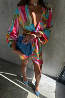 Thumbnail for caption_Model wears Multi Abstract Vienna Mini Wrap Dress in UK size 10/ US 6