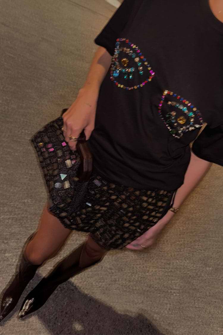 caption_Model wears Black Beaded Mirror Skirt in size S