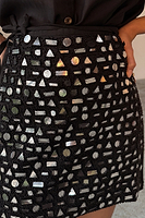 Thumbnail for caption_Model wears Black Beaded Mirror Skirt in size S