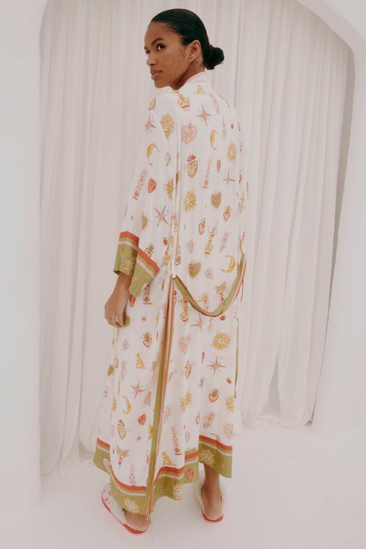 caption_Model wears Cream Mystical Maxi Robe in size M