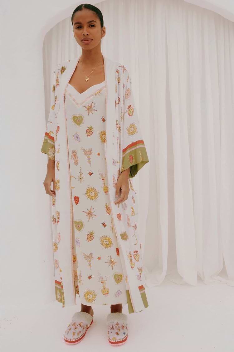 caption_Model wears Cream Mystical Maxi Robe in size M