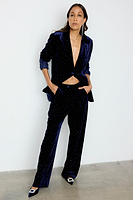 Thumbnail for  caption_Model wears Navy Velvet Hot Fix Arden Trousers  in UK size 8/ US 4
