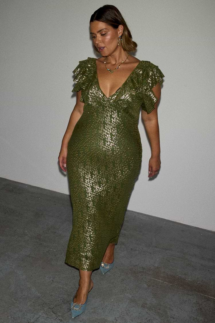 caption_Model wears Olive Jacquard Tilda Dress in UK size 18/ US 14