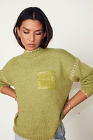 Thumbnail for caption_Model wears Olive Virgo Jumper in size S