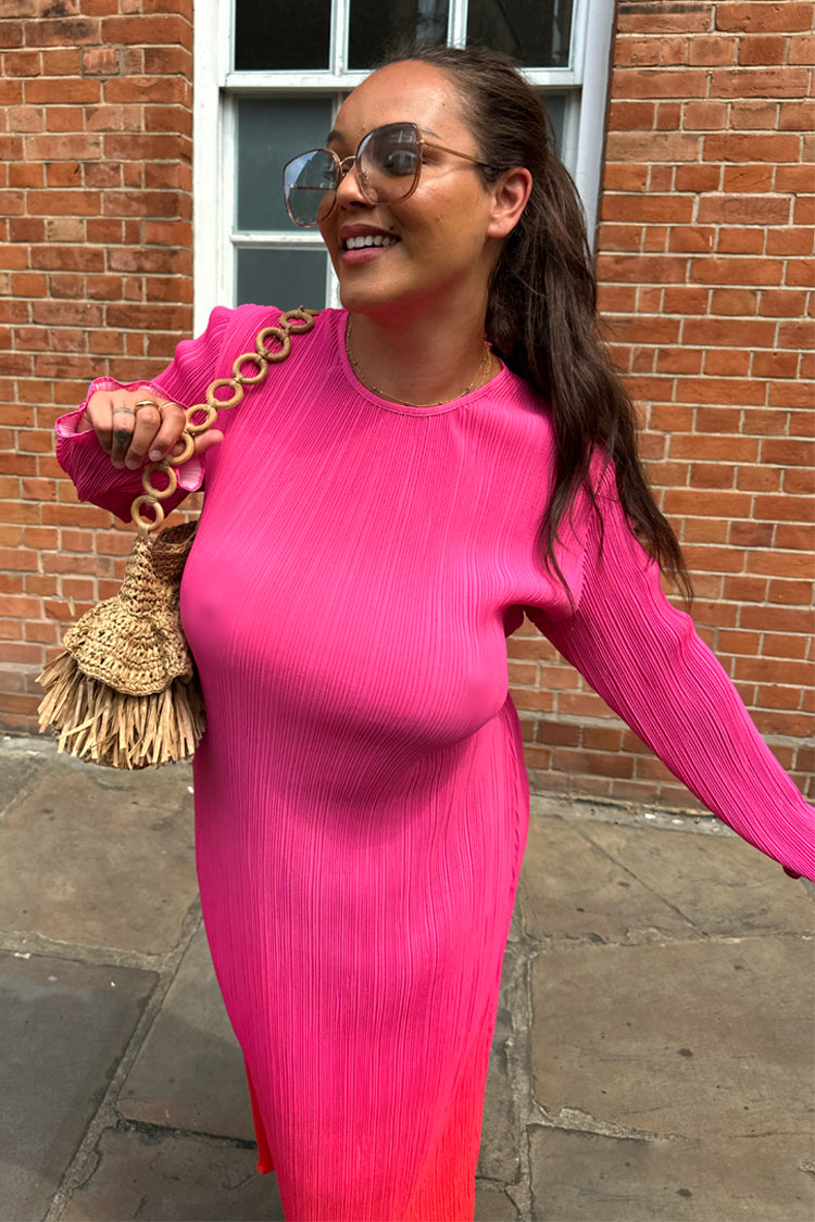 caption_Model wears Red and Pink Ombre Plisse Dress in UK size 18/ US 14