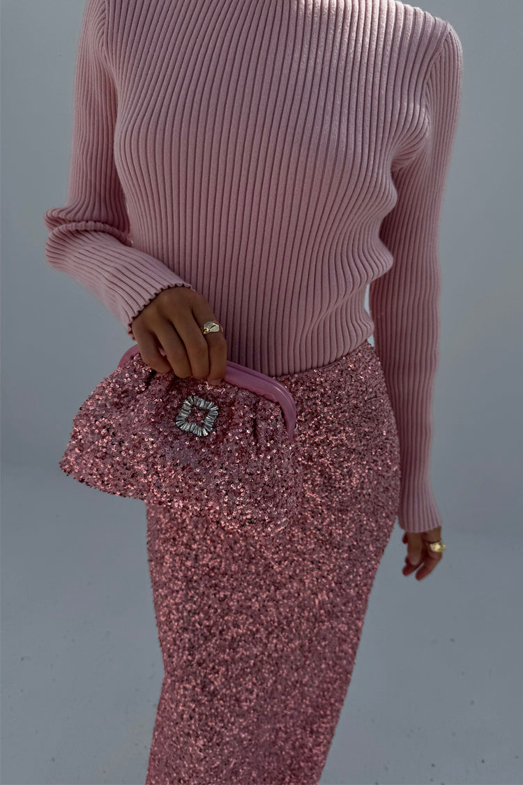 caption_Model wears 
 Pink Rib Knit Jumper in size XS