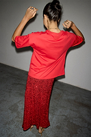 Thumbnail for caption_Model wears Red Sequin Dorris Skirt in UK size 8/ US 4