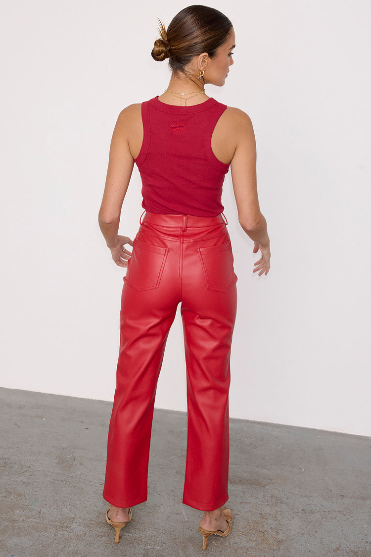 caption_Model wears Deep Red Vegan Leather Trousers in UK size 10/ US 6