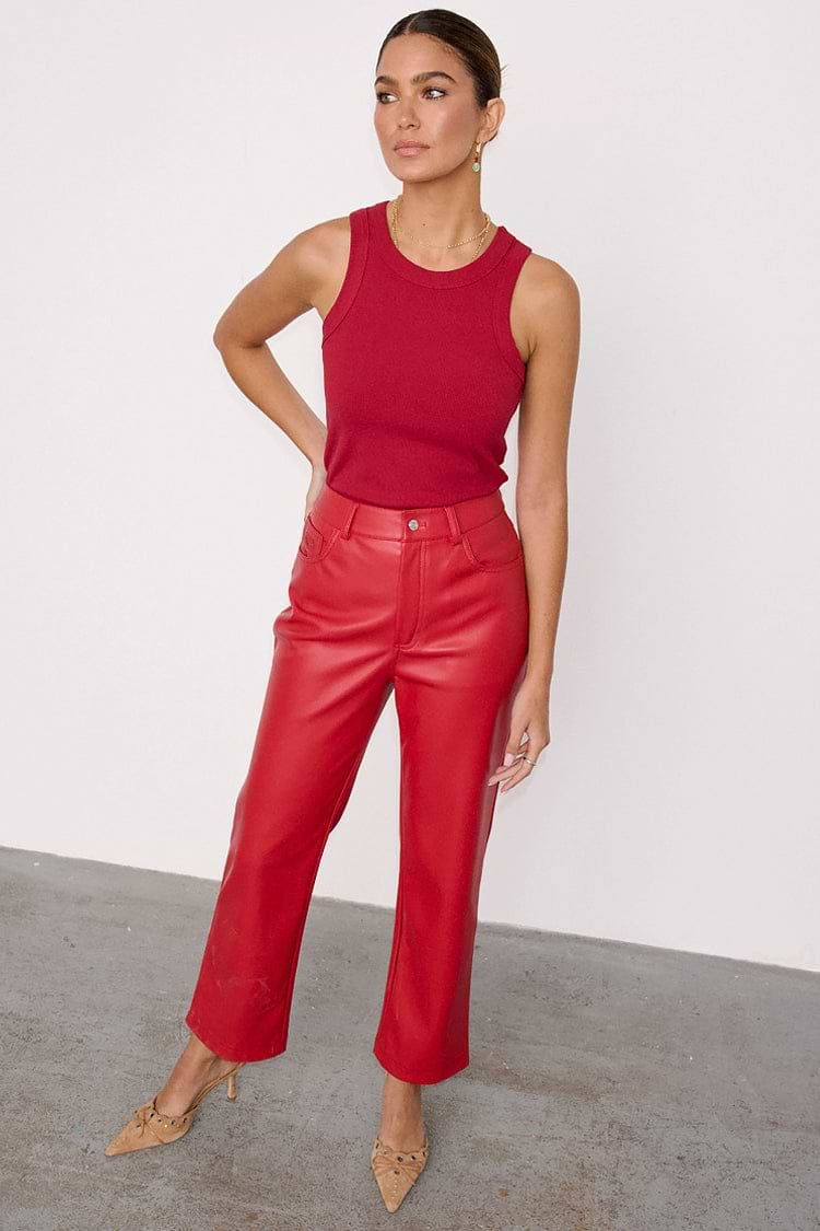 caption_Model wears Deep Red Vegan Leather Trousers in UK size 10/ US 6