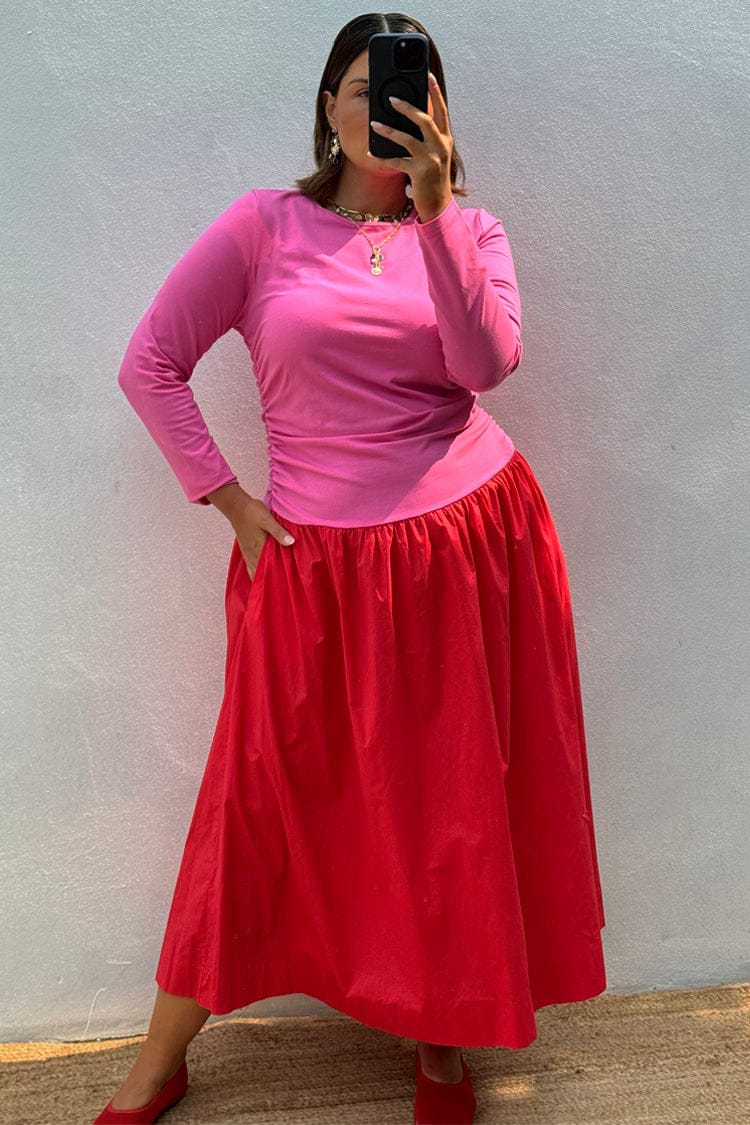 caption_Model wears Red and Pink Long Sleeve Lola Dress in UK size 18/ US 14