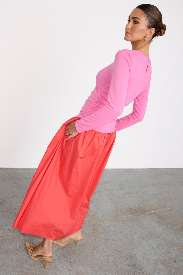 caption_Model wears Red and Pink Long Sleeve Lola Dress in UK size 10/ US 6