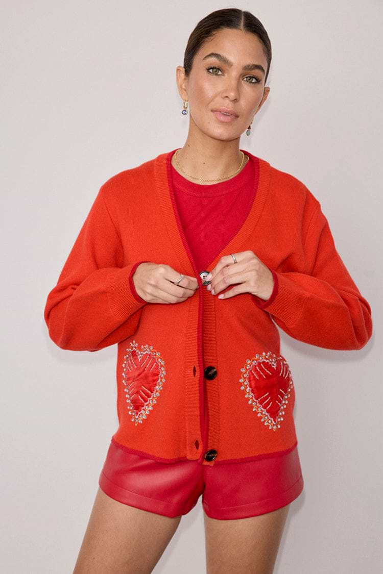 caption_Model wears Red Heart Cardigan  in size M