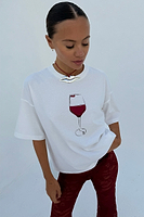 Thumbnail for caption_Model wears Vino T-Shirt in UK size M